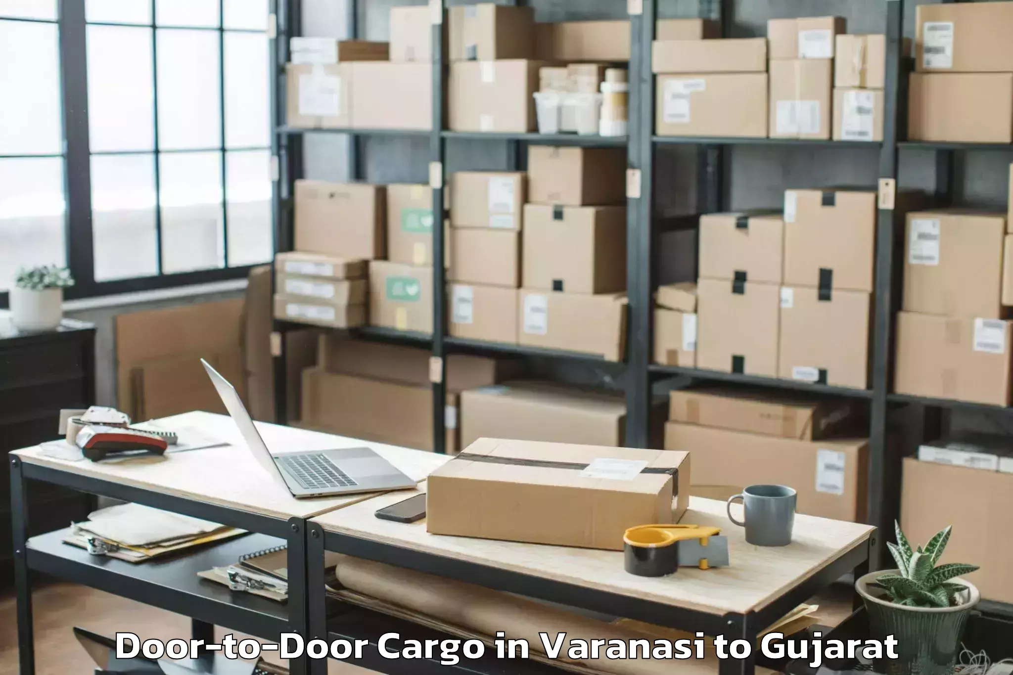 Book Varanasi to Jhulasan Door To Door Cargo Online